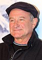 Robin Williams, actor, comedian, scenarist, producător și cântăreț american