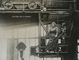 A woman operating a 20-ton[which?] EOT crane, 1914