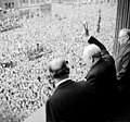 Churchill waves to crowds in Whitehall on the day he broadcast to the nation that the war with Germany had been won, 8 May 1945