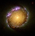 Überlagerung von Ultraviolett-, Infrarot- und Aufnahmen des sichtbaren Spektrums des Hubble-Weltraumteleskops vom Zentrum der Galaxie
