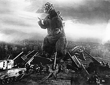 Godzilla stands against an armada, used for marketing purposes.