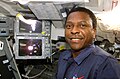 Payload commander Michael P. Anderson on the aft flight deck