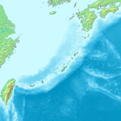 Mapa konturowa prefektury Okinawa, w centrum znajduje się punkt z opisem „Nago”