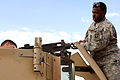 U.S. soldier fixing a machine gun