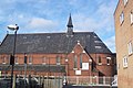 The former Lady Margaret Church, Chatham Street, Southwark, London, built for the St John's College (Cambridge) Mission in 1888–89 by Ewan Christian, now used as the Order of Cherubim and Seraphim Church. Red brick Early English style with typical lancets and apse[162]