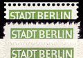 Differenti tipi di perforazione dovuti all'utilizzo di differenti perforatori, francobollo emesso dalla Germania Est