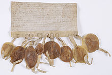 Photographie de la lettre circulaire adressée par les prélats et barons du royaume aux évêques et grands feudataires pour les inviter à assister au Couronnement du jeune Louis IX.