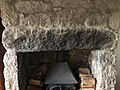 Moorstone fireplace in a house at Sharptor showing remnants of plug and feather method to split the rock