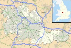 Mapa konturowa West Midlands, blisko centrum na dole znajduje się punkt z opisem „BHX”