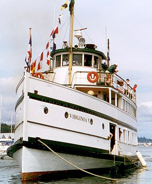 Port bow view of a steamer at her moorings.