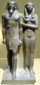 Image 23Greywacke statue of the pharaoh Menkaure and his queen consort, Khamerernebty II. Originally from his Giza temple, now on display at the Museum of Fine Arts, Boston. (from History of ancient Egypt)