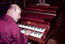 Hans Adler performing on his modern Pleyel harpsichord