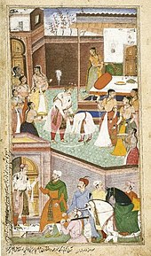 In the top, central figure of a young Chirakari touching the feet of a middle-aged Gautma, both dressed in royal Mughal clothes. Numerous royal ladies surround them. In the bottom of the painting, outside the door are royal men with horses.