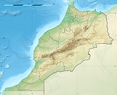 Mapa konturowa Maroka, w centrum znajduje się punkt z opisem „Marrakesz”