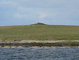 Veltie Skerry and the cairn on the Holm of Huip