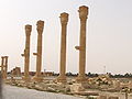 Colonne con mensola portastatua