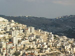 เยรูซาเลมตะวันออกกับกำแพงเวสต์แบงค์อิสราเอลในพื้นหลัง