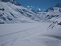 Zugefrorener Silvrettasee mit Loipen vor Inbetriebnahme des Obervermuntwerkes II.