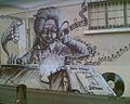 Mozart em graffiti popular, representado como um DJ.