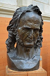 photo : buste de bronze de Paganini, longs cheveux, favoris et front plissé
