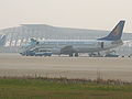 A Xinhua Airline plane in front of the then Terminal 2