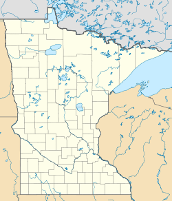 A map of Minnesota with a dot in the lower east part of the state