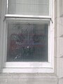 The Coat of arms of Haiti embossed on the old embassy's window