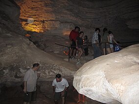 Visitors explore Longhorn Cavern