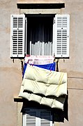 Airing a feather duvet in Dubrovnik, 2010