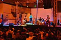 Native American musical group playing at Day of the Dead festivities