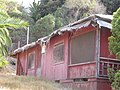 side view of "Red Roost", a bungalow cottage built in 1894, one of two that still exist on the road above La Jolla Cove