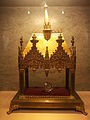 Fragment of the soutane worn by Pope John Paul II on the 13th May 1981 and marked with his blood. in France in the Basilica of St. Pius X.