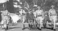 Image 15Lieutenant-General Arthur Percival, led by a Japanese officer, marches under a flag of truce to negotiate the capitulation of Allied forces in Singapore, on 15 February 1942. It was the largest surrender of British-led forces in history. (from History of Singapore)