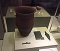Beaker, wrist-guard with gold studs, copper dagger and toggle.[204]