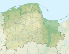 Mapa konturowa województwa pomorskiego, blisko centrum na prawo u góry znajduje się owalna plamka nieco zaostrzona i wystająca na lewo w swoim dolnym rogu z opisem „Ptasi Raj”
