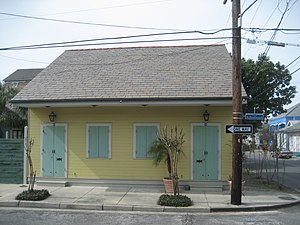 Weatherboard Creole Cottage with two sets of French doors and two double hung windows[2]