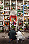 Graveyard visit at the Day of the Dead celebration