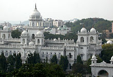 White building with multiple domes