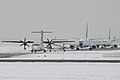 EuroLOT, snow, in front of a beech 1900 and two 737