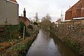 El riu desapareix entre les cases a Steenbrugge