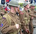 En 1938 o exército británico adoptou no seu uniforme de campaña a chaqueta curta.