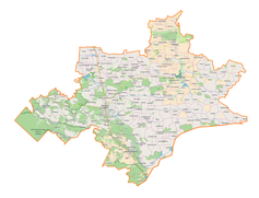 Mapa konturowa powiatu tomaszowskiego, blisko dolnej krawiędzi znajduje się punkt z opisem „Siedliska”