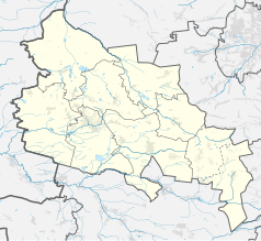 Mapa konturowa powiatu lublinieckiego, blisko centrum na lewo znajduje się punkt z opisem „Kochcice”