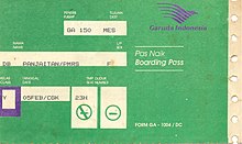 A boarding ticket issued by Garuda Indonesia, colored mainly in green. The ticket shows a passenger flying GA 150 to Medan. The boarding ticket shows that there are non-smoking and smoking sections on the aircraft.