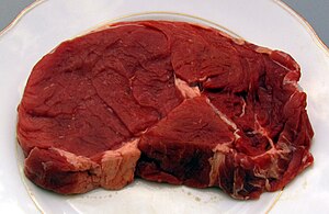 A raw French rib eye steak, without the bone (entrecôte)