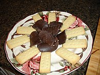 Chocolate-covered potato chips (center), with shortbread cookies around them