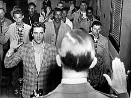 Elvis being sworn into the US Army