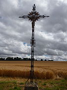 Un calvaire situé à l'intersection de la D 94 et de la D 117.