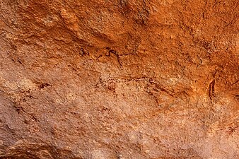 Rock painted shepherds with cattle