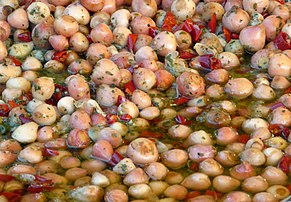 Lampascioni sott'olio, prepared bulbs of the grape hyacinth Leopoldia comosa preserved in olive oil